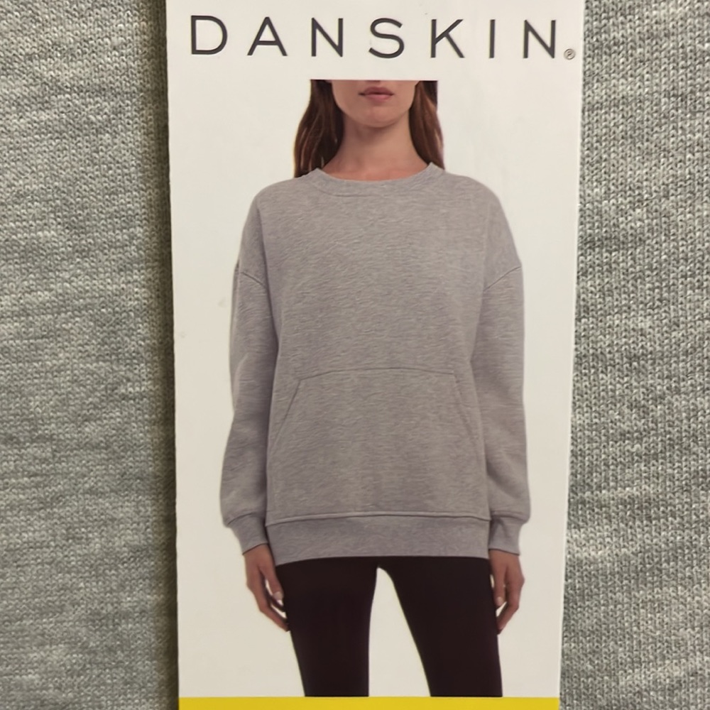 Brand new with tags woman’s pull over sweater, light grey color size small.